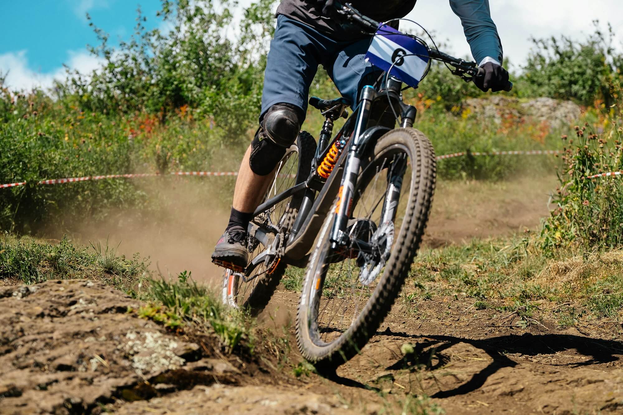 mountain bike racer trail downhill competition